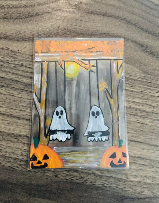 Halloween-themed ACEO card with ghosts and pumpkins.