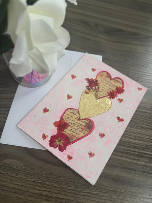 Greeting card with heart designs .