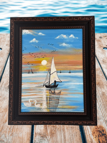 Sailing into Serenity – Framed Nautical Sunset Art with Swans & Sailboat - GalaxyArtWork