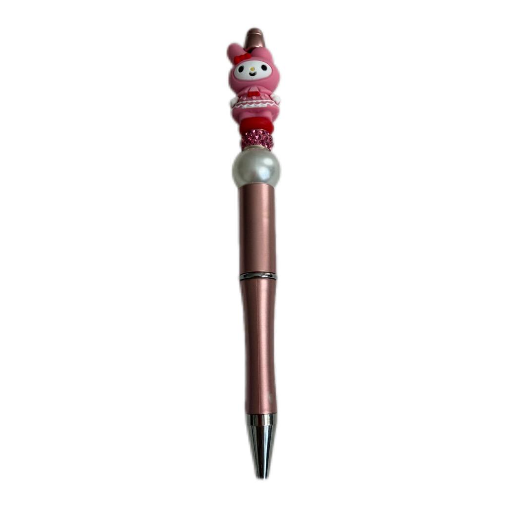 Hand beaded Pen with a decorative top featuring a cartoon character.