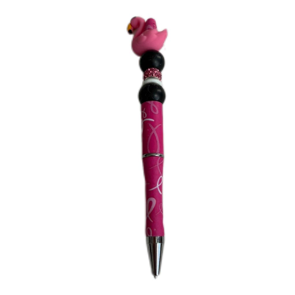 Hand beaded pink pen with a flamingo-shaped top.