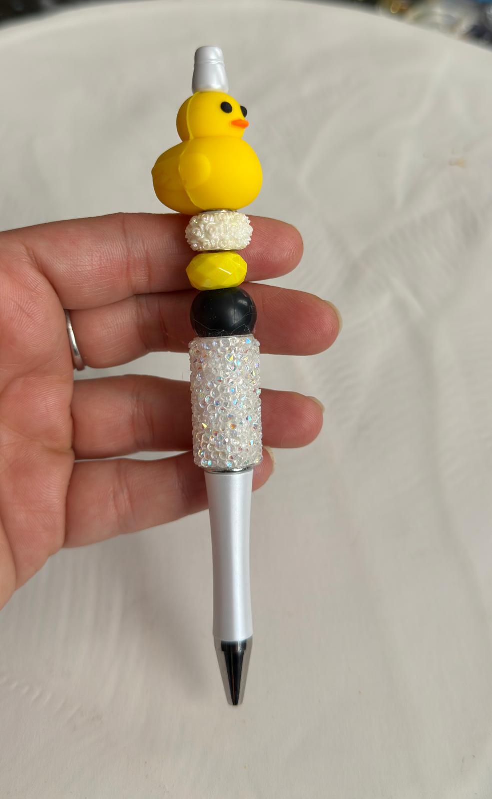 Handmade beaded pen with a cute yellow duck on a silver ballpoint pen.