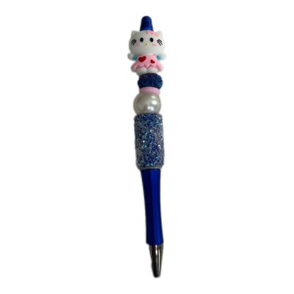 Handmade blue bunny beaded pen with character topper, decorative beads, and floral-patterned ballpoint pen body.