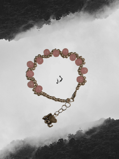 Blush Elegance Bracelet – Soft Pink & Gold Beaded Jewelry with Baby Carriage Charm