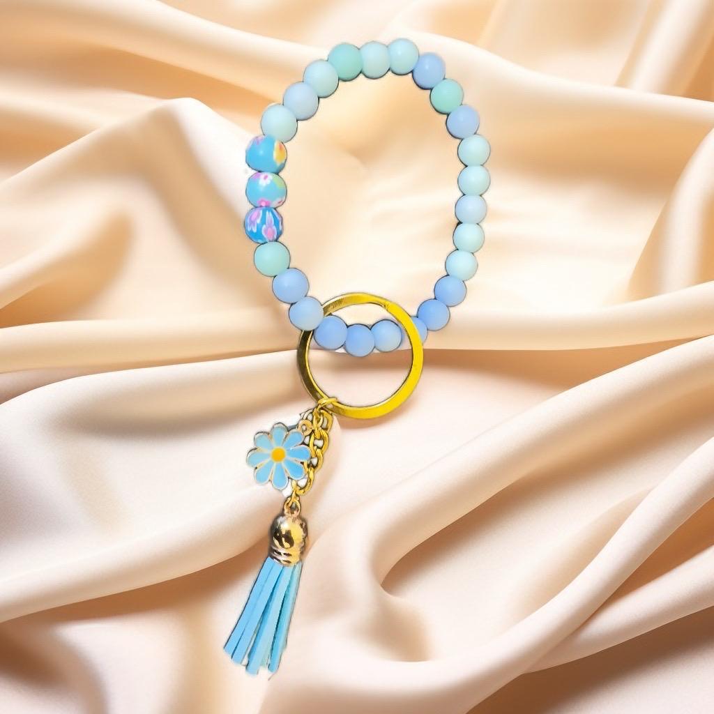 Pastel Beaded Keychain Bracelet with Daisy Charm and Tassel - GalaxyArtWork