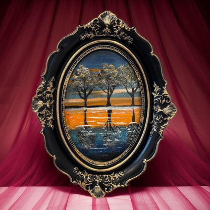 Decorative painting of a landscape with trees and a person in a black and gold ornate frame .