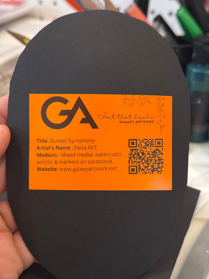 Framed painting “Sunset Symphony” by Faiza Atif – an oval mixed media artwork of sunset trees and reflections, set in a black and gold ornate frame.