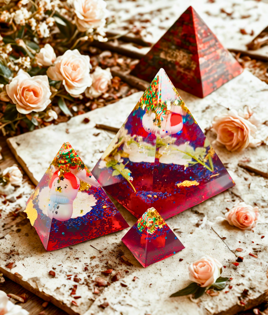 Triangular resin pieces with embedded snowmen.