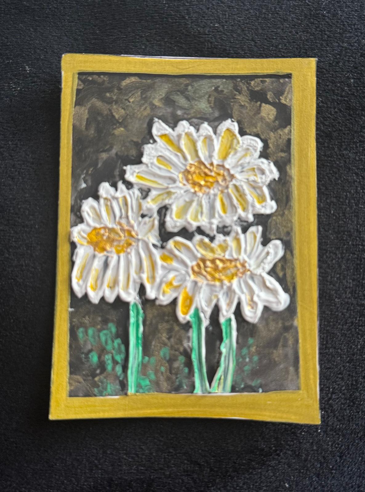 Hand-painted ACEO card of three white daisies with golden centers on dark textured background.