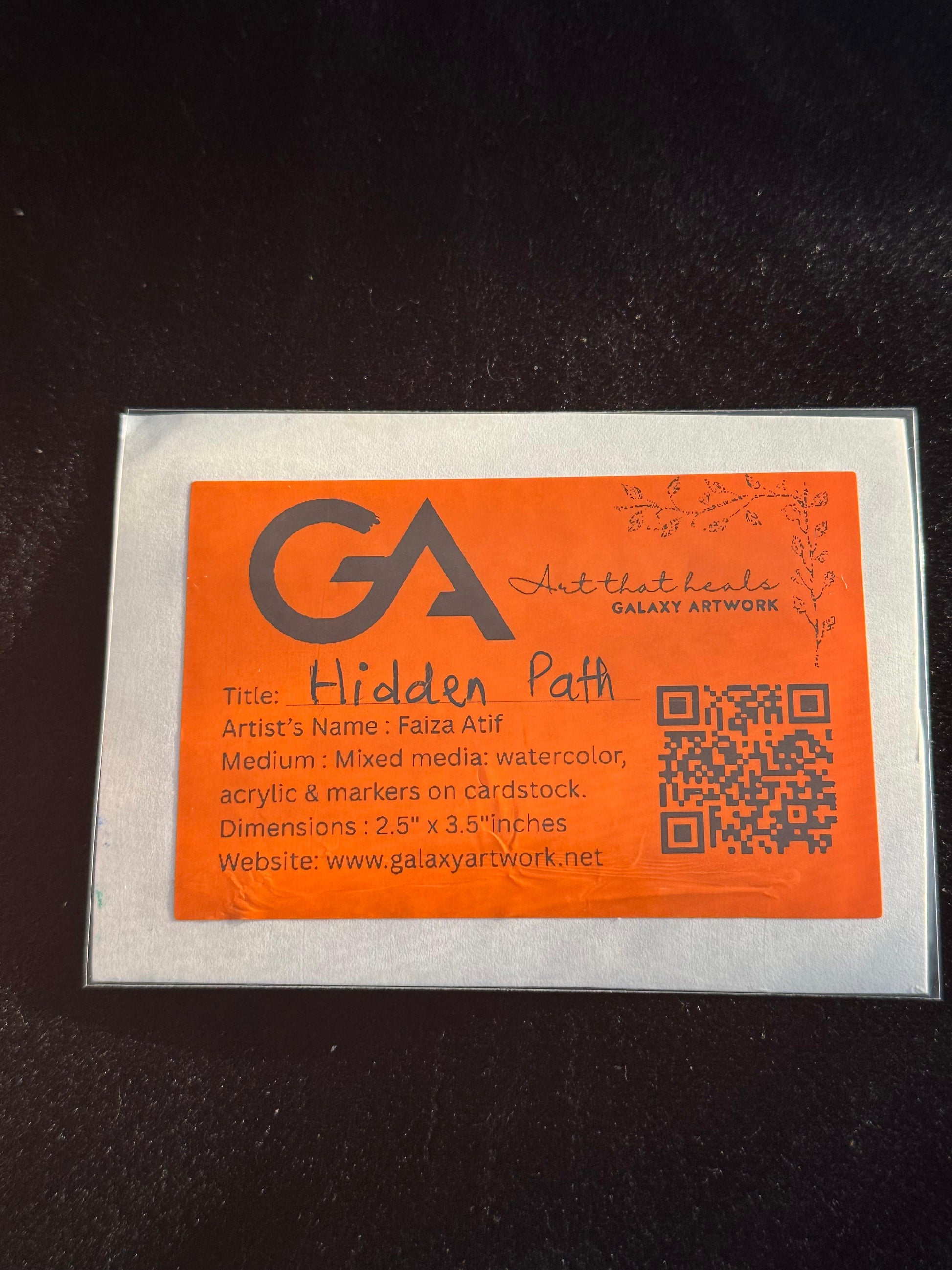 Orange label with 'GA' logo and text on a clear background
