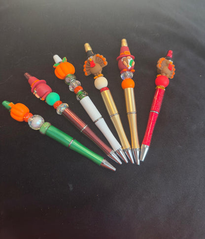 Set of decorative pens with colorful beads for fall theme