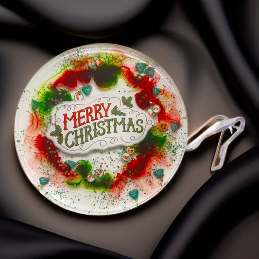 Decorative plate with 'Merry Christmas' text and colorful design .