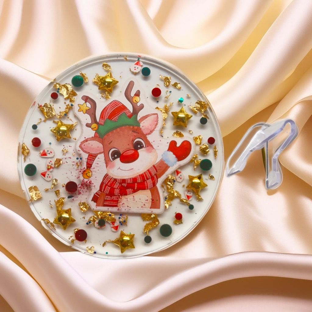 Decorative plate with a reindeer design for holiday decor.
