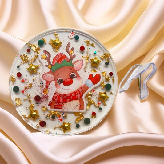 Decorative plate with a reindeer design for holiday decor.