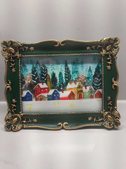 Original painting with Decorative frame with a winter scene of houses and trees.