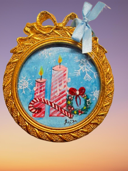 Handmade mini acrylic painting of two striped candles, a wreath, and a candy cane in a round gold frame with a blue ribbon.