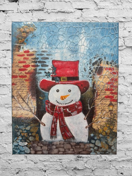 Handmade acrylic painting of a snowman wearing a red hat and scarf with a textured winter brick background.