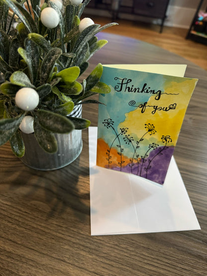 Card with 'Thinking of you' message .
