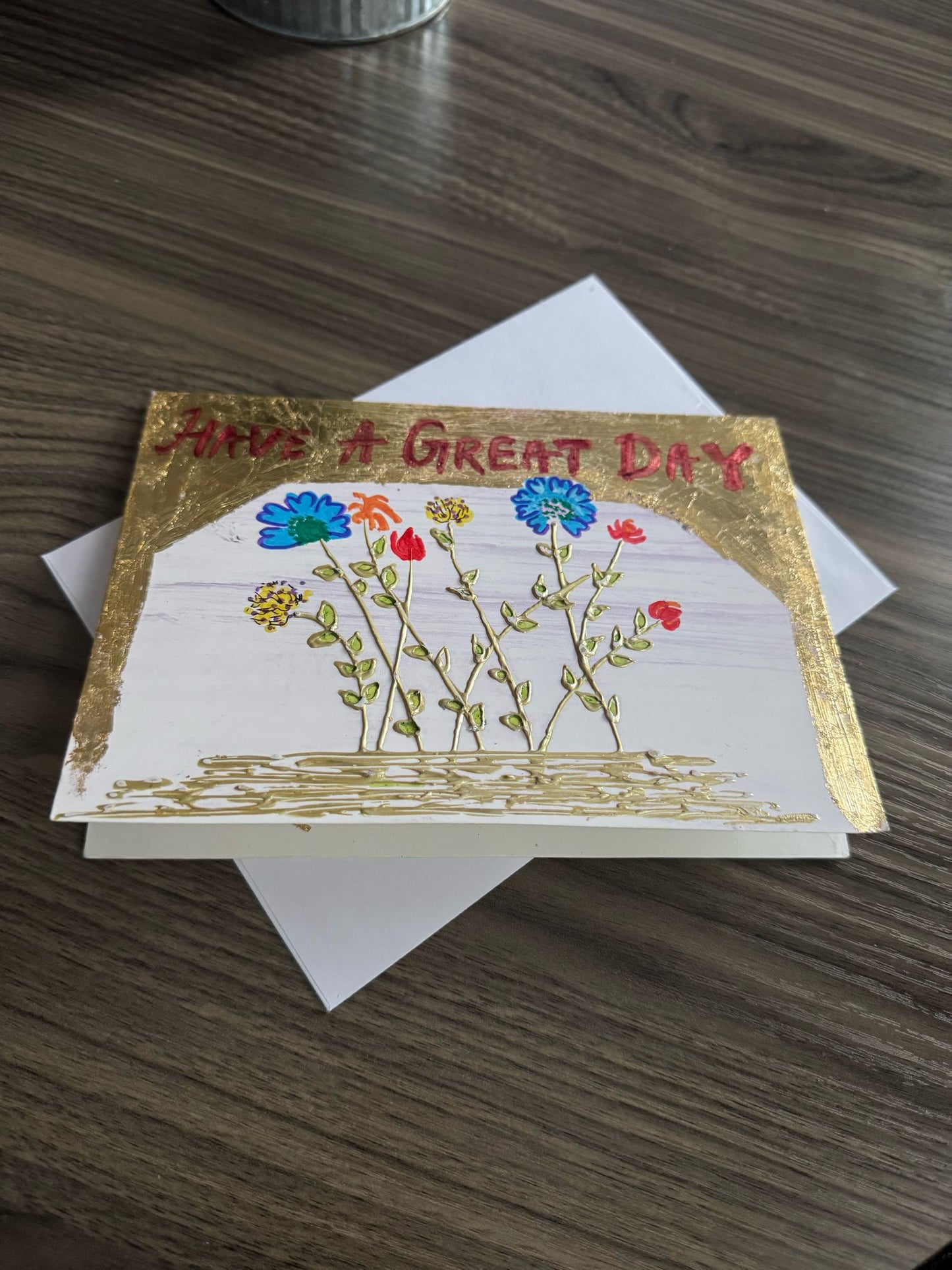 Greeting card with floral design and 'Have a Great Day' text .