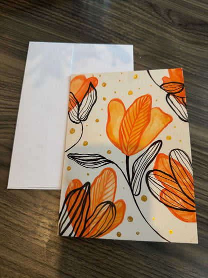 Card with yellow floral design .