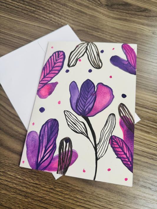 Card with purple floral design