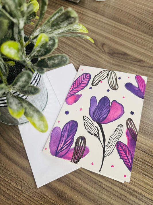 Greeting card with purple and pink floral design 