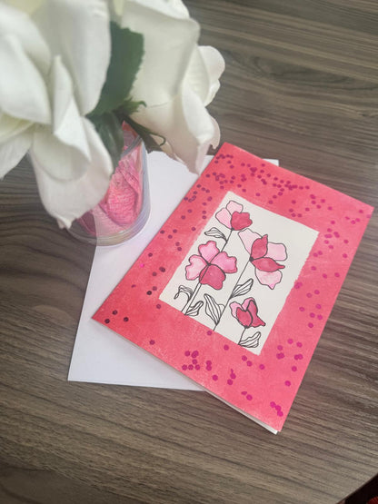 Handmade floral greeting card with pink blossoms and dotted border – 5x7 inches, blank inside with envelope.