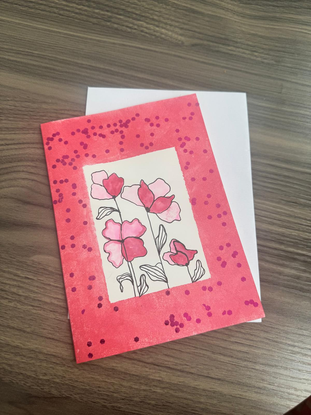 Greeting card with pink floral design 