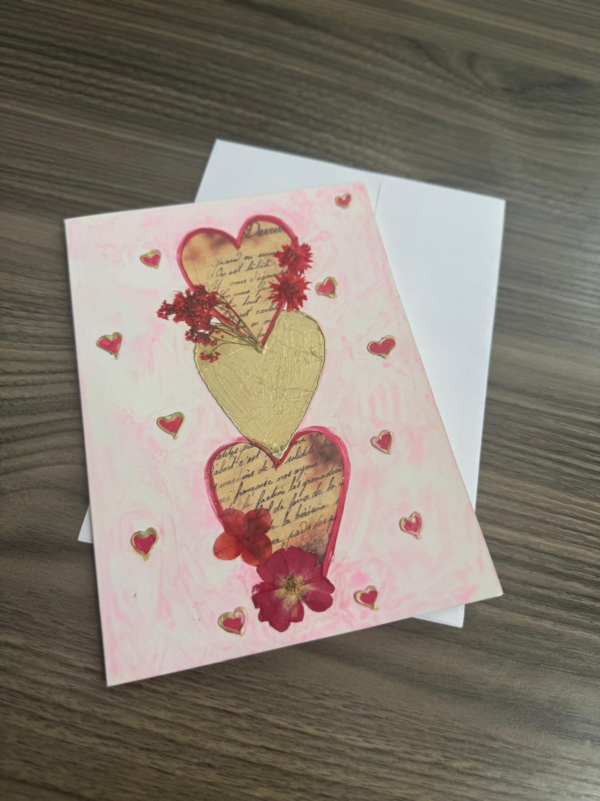 Greeting card with heart design and flowers