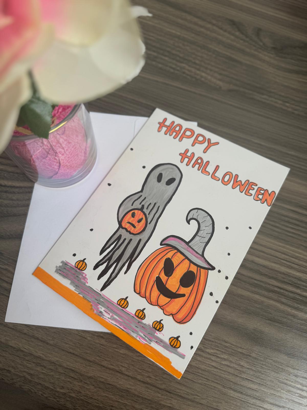 Hand-painted Halloween card with ghost and pumpkin characters and Happy Halloween text – blank inside with envelope.