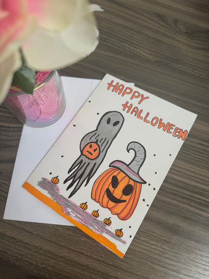 Hand-painted Halloween card with ghost and pumpkin characters and Happy Halloween text – blank inside with envelope.