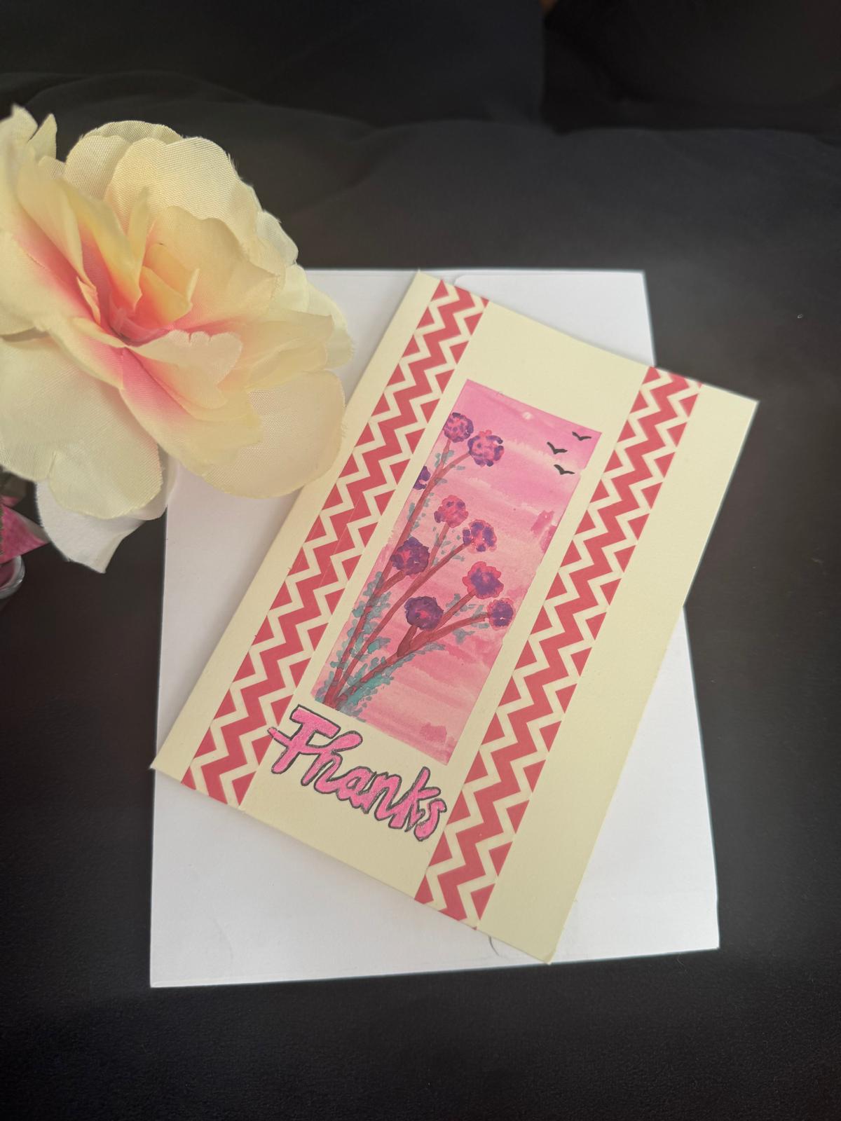 Greeting card with floral design and 'Thanks' text .