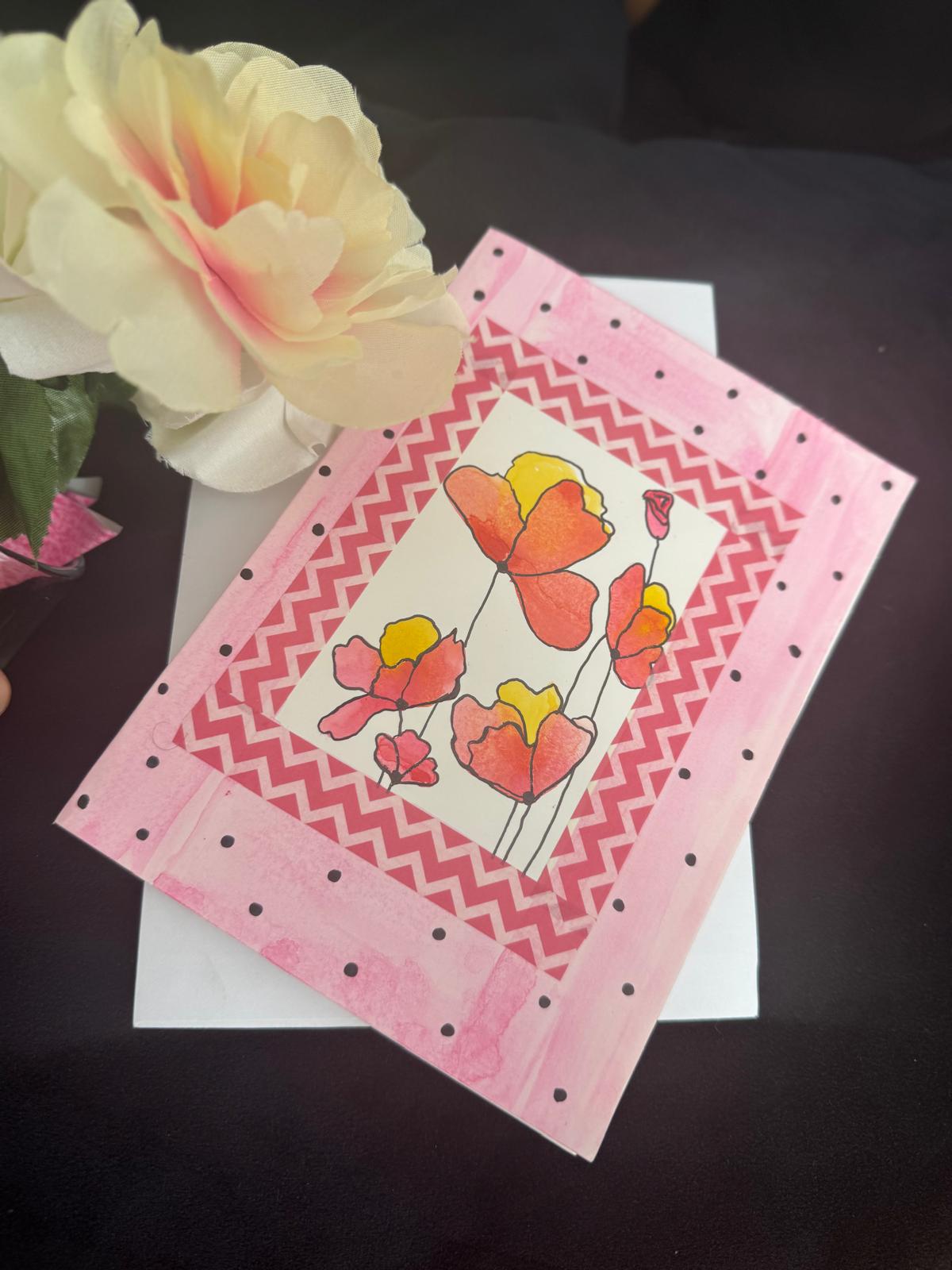 Hand-painted floral greeting card with red and yellow flowers, chevron and dotted border – 5x7 inches, blank inside with envelope.