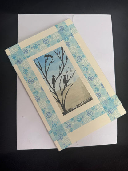 Greeting card with nature-themed design on a white envelope